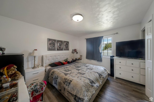 6231 S Westbrook Dr W, Taylorsville, UT 84129 - bedroom featuring dark wood-type flooring