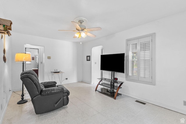 150 S 100 W, Tooele, UT 84074 - living room with a ceiling fan and baseboards