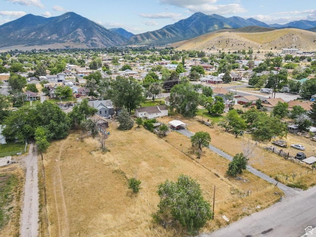 150 S 100 W, Tooele, UT 84074 - aerial perspective of suburban area with a mountain backdrop