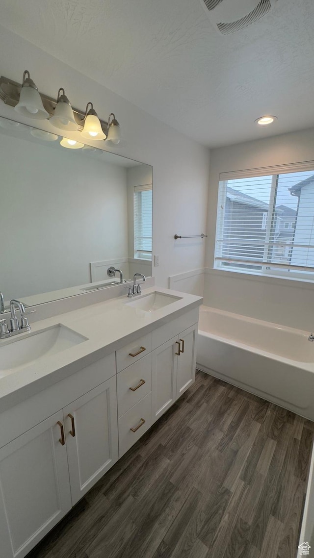 427 E 340 N, Vineyard, UT 84059 - bathroom with wood finished floors, a bath, and double vanity