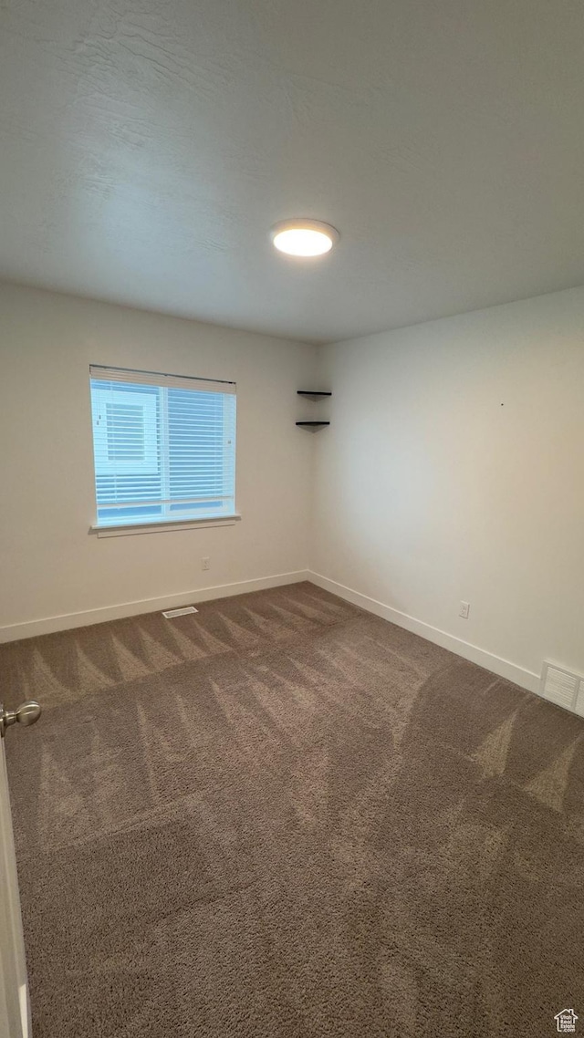 427 E 340 N, Vineyard, UT 84059 - empty room with baseboards and dark carpet