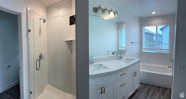 427 E 340 N, Vineyard, UT 84059 - full bath with a stall shower, double vanity, a garden tub, wood finished floors, and recessed lighting