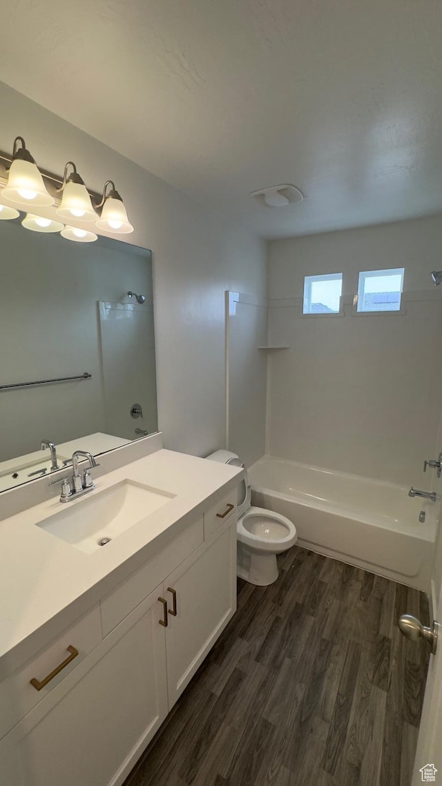 427 E 340 N, Vineyard, UT 84059 - bathroom with wood finished floors, vanity, and  shower combination