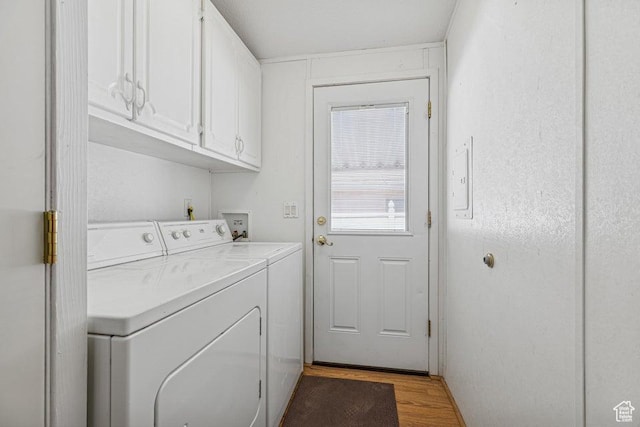 4400 W State St Unit 48, Hurricane, UT 84737 - laundry area with separate washer and dryer, cabinet space, and light wood finished floors