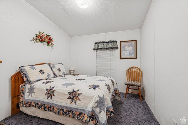 4400 W State St Unit 48, Hurricane, UT 84737 - carpeted bedroom featuring lofted ceiling, a textured ceiling, and ornamental molding