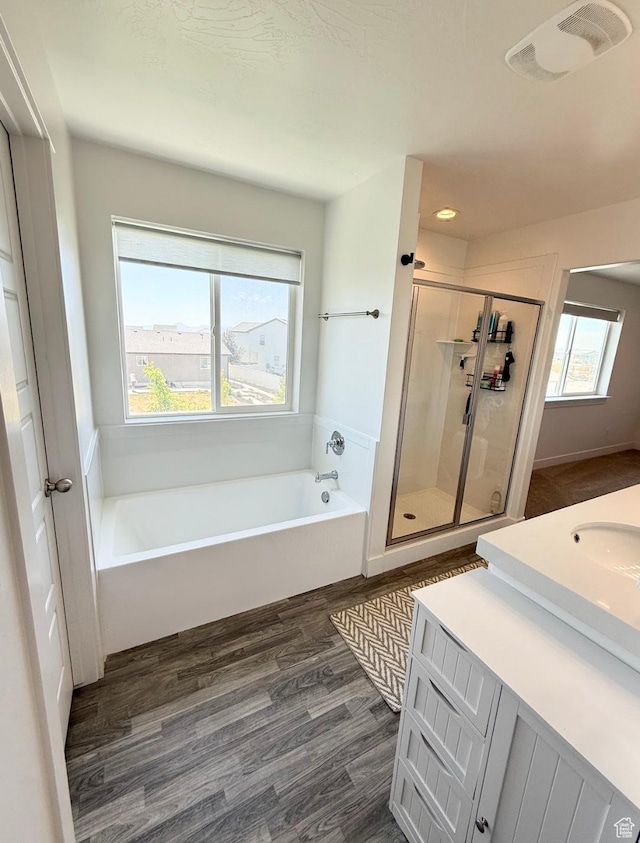 1258 E Bell Buoy Way, Eagle Mountain, UT 84005 - full bath featuring a bath, a shower stall, healthy amount of natural light, vanity, and recessed lighting