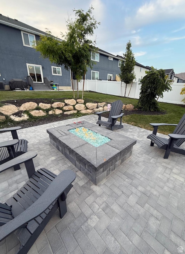 1258 E Bell Buoy Way, Eagle Mountain, UT 84005 - view of patio / terrace featuring a fire pit