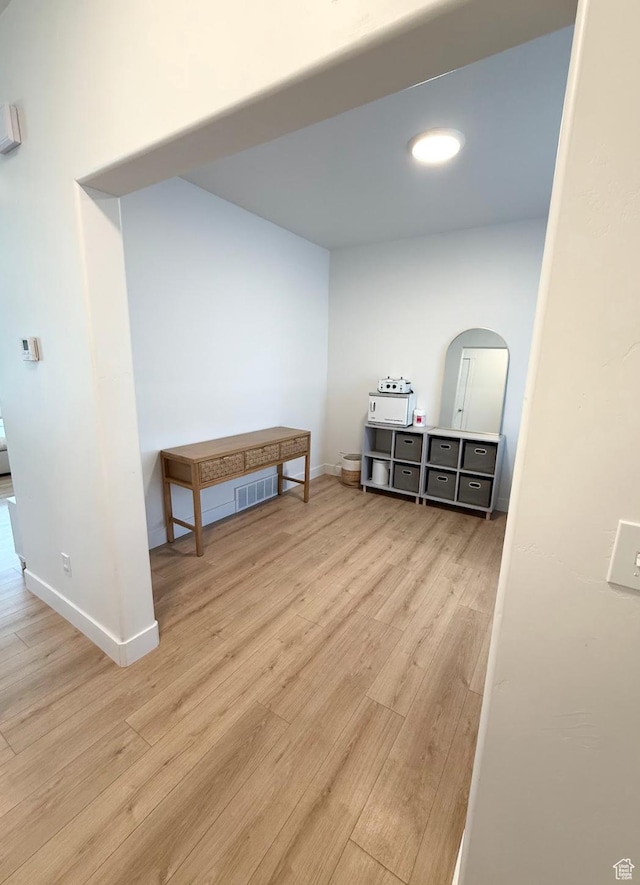 1258 E Bell Buoy Way, Eagle Mountain, UT 84005 - interior space with wood finished floors and arched walkways