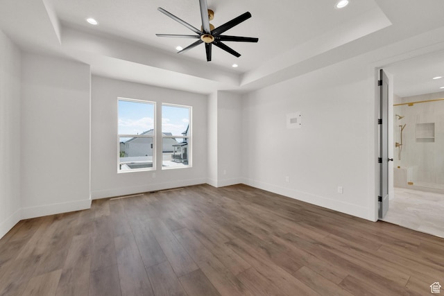 761 W 880 N, American Fork, UT 84003 - empty room with a tray ceiling, recessed lighting, a ceiling fan, and wood finished floors