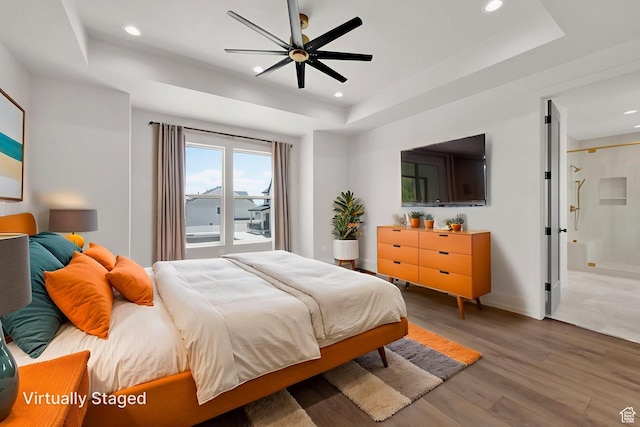 761 W 880 N, American Fork, UT 84003 - bedroom with a tray ceiling, wood finished floors, recessed lighting, ensuite bathroom, and a ceiling fan