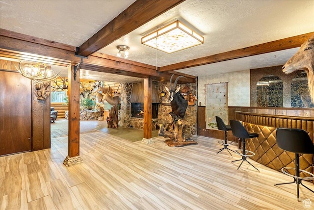 6690 S 1495 E, Cottonwood Heights, UT 84121 - basement with wood finished floors, wainscoting, wood walls, and a textured ceiling
