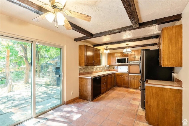 6690 S 1495 E, Cottonwood Heights, UT 84121 - kitchen featuring stainless steel appliances, brown cabinetry, a textured ceiling, beam ceiling, and ceiling fan