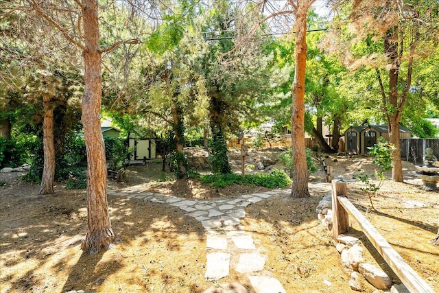 6690 S 1495 E, Cottonwood Heights, UT 84121 - view of yard featuring a storage shed