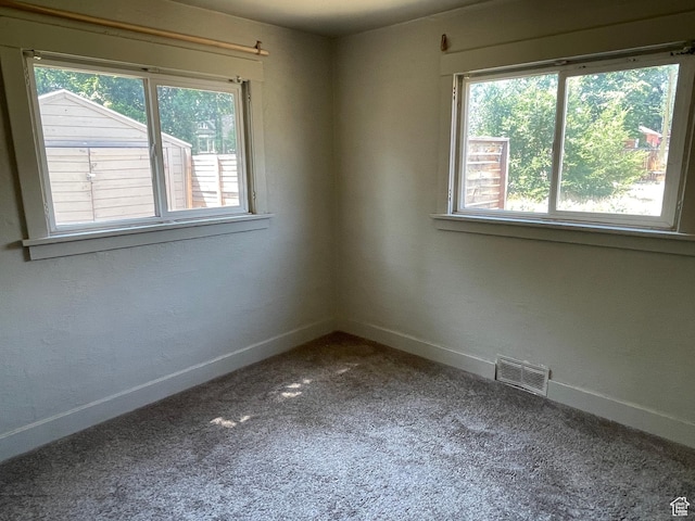 2163 Adams Ave, Ogden, UT 84401 - carpeted empty room with baseboards