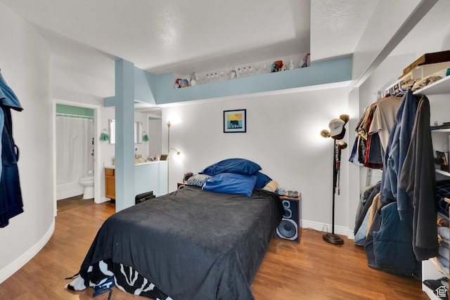 1380 W Ocean Ct, Salt Lake City, UT 84123 - bedroom with wood finished floors and ensuite bathroom