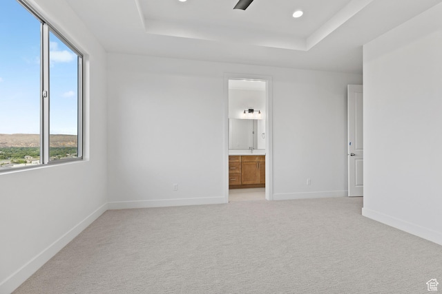 2162 W 320 S Unit 51, Hurricane, UT 84737 - spare room with a raised ceiling, plenty of natural light, light colored carpet, and recessed lighting