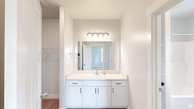3715 W 1480 N Unit 303, Lehi, UT 84043 - bathroom featuring vanity, tub / shower combination, and a spacious closet