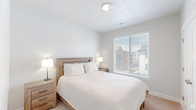 3715 W 1480 N Unit 303, Lehi, UT 84043 - bedroom featuring light carpet and baseboards
