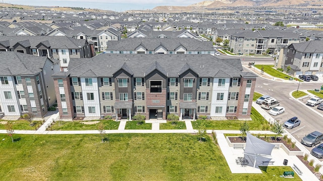 3715 W 1480 N Unit 303, Lehi, UT 84043 - aerial perspective of suburban area featuring a mountainous background