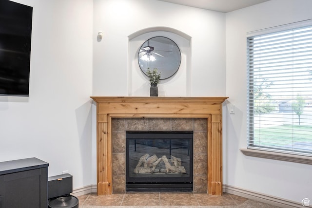 5689 W Sandy Stone Cir S, South Jordan, UT 84009 - detailed view of a tile fireplace and a ceiling fan