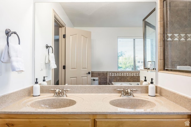 5689 W Sandy Stone Cir S, South Jordan, UT 84009 - full bathroom featuring double vanity and a tub with jets