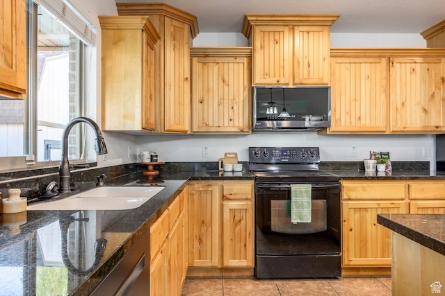5689 W Sandy Stone Cir S, South Jordan, UT 84009 - kitchen with stainless steel microwave, black electric range, light brown cabinets, dishwashing machine, and dark stone counters