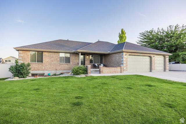 5689 W Sandy Stone Cir S, South Jordan, UT 84009 - single story home featuring a garage, brick siding, concrete driveway, and roof with shingles