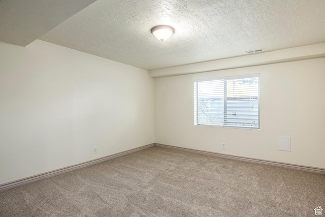 5689 W Sandy Stone Cir S, South Jordan, UT 84009 - carpeted empty room featuring a textured ceiling and baseboards