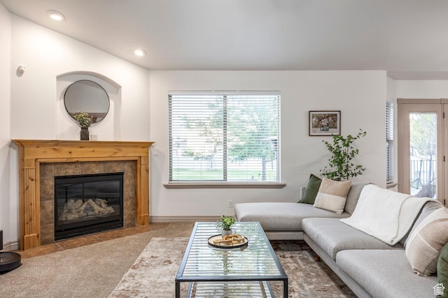 5689 W Sandy Stone Cir S, South Jordan, UT 84009 - carpeted living room featuring healthy amount of natural light, a fireplace, and recessed lighting