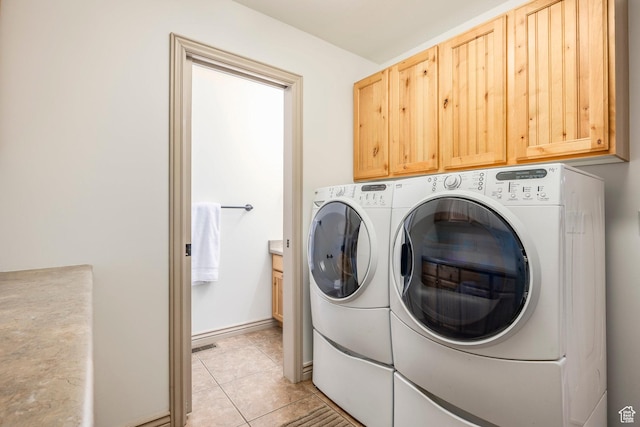 5689 W Sandy Stone Cir S, South Jordan, UT 84009 - laundry room with separate washer and dryer, cabinet space, and light tile patterned floors