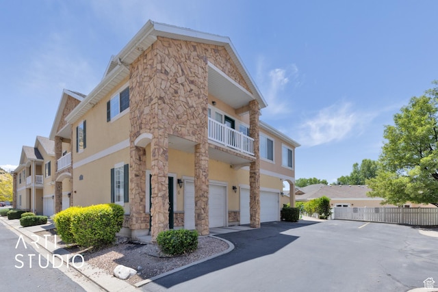 1068 Canyon Meadow Dr Unit 8, Provo, UT 84606 - view of building exterior with an attached garage