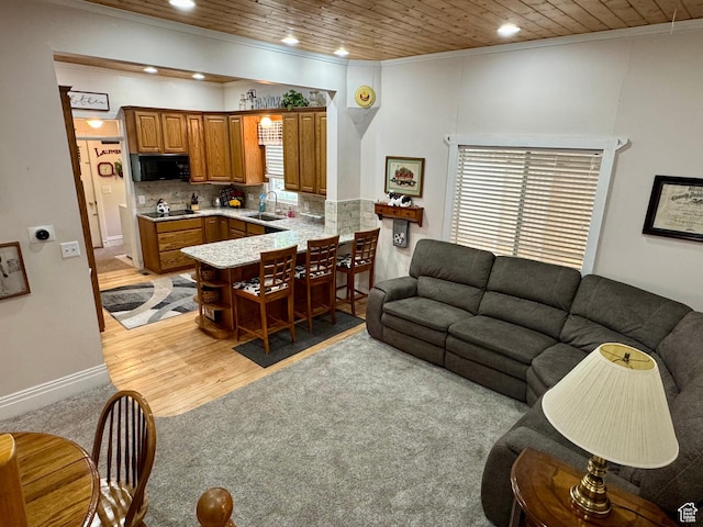 12 S Main, Holden, UT 84636 - living area featuring recessed lighting, crown molding, wooden ceiling, light carpet, and light wood-style floors