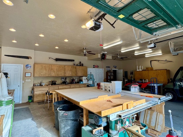 12 S Main, Holden, UT 84636 - garage featuring a garage door opener, a workshop area, a ceiling fan, and recessed lighting