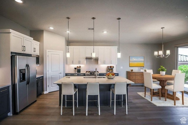 621 N Sage Hen Dr, Washington, UT 84780 - kitchen featuring stainless steel fridge with ice dispenser, dark wood-type flooring, white cabinets, and recessed lighting