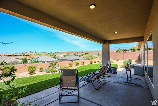 621 N Sage Hen Dr, Washington, UT 84780 - fenced backyard featuring a patio area and a mountain view