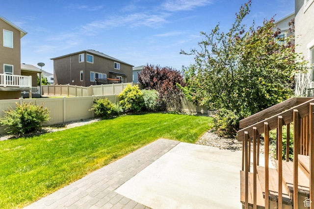 4567 W Breezy Meadow Dr, Herriman, UT 84096 - fenced backyard featuring a patio and a residential view