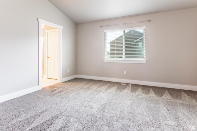 4567 W Breezy Meadow Dr, Herriman, UT 84096 - carpeted spare room with vaulted ceiling and baseboards
