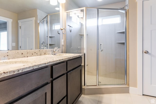 4567 W Breezy Meadow Dr, Herriman, UT 84096 - bathroom with double vanity, tile patterned floors, and a stall shower