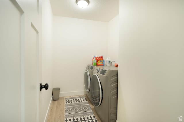 1065 W 200 N, Provo, UT 84601 - laundry area featuring washer and clothes dryer and wood finished floors