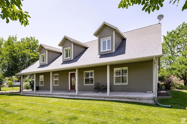 8871 S 100 E, Paradise, UT 84328 - view of front facade featuring covered porch, a shingled roof, and a front lawn