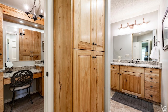 8871 S 100 E, Paradise, UT 84328 - bathroom featuring a chandelier, vanity, and tile patterned flooring