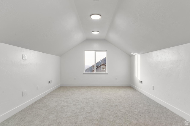 6809 W Vista Springs Dr, Herriman, UT 84096 - additional living space featuring lofted ceiling and light colored carpet