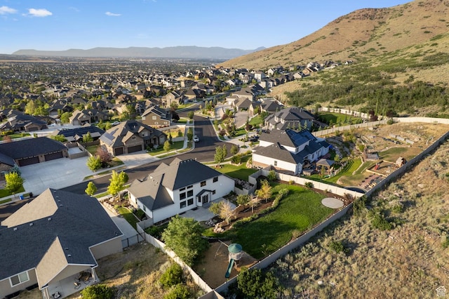 6809 W Vista Springs Dr, Herriman, UT 84096 - aerial view of property and surrounding area with nearby suburban area and a mountain backdrop