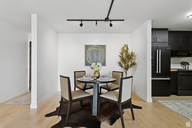 123 E 2nd Ave Unit 505, Salt Lake City, UT 84103 - dining room featuring light wood-type flooring and track lighting