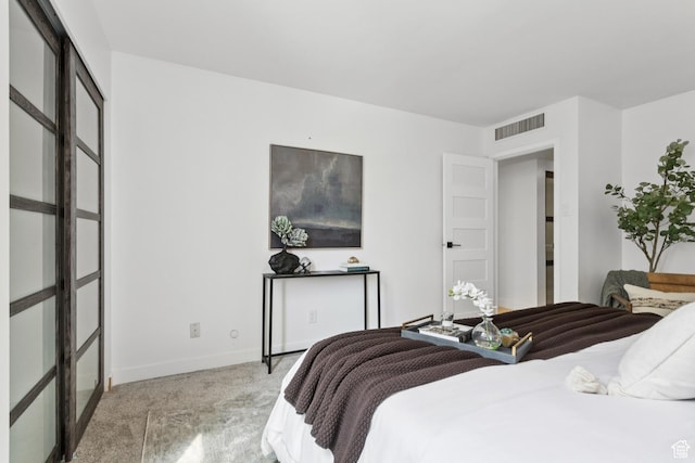 123 E 2nd Ave Unit 505, Salt Lake City, UT 84103 - bedroom featuring light colored carpet and baseboards