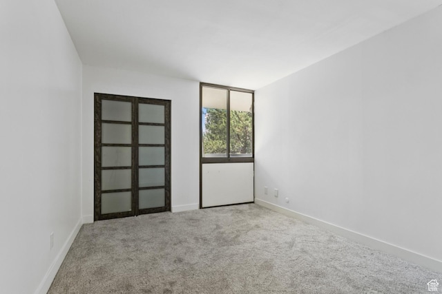 123 E 2nd Ave Unit 505, Salt Lake City, UT 84103 - carpeted empty room featuring baseboards