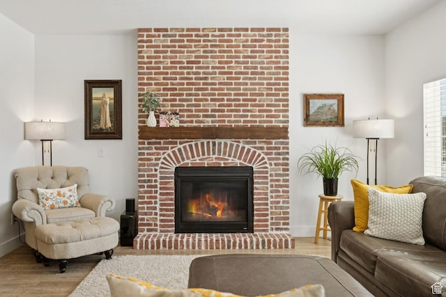 319 S 300 E, Midway, UT 84049 - living room featuring wood finished floors and a fireplace