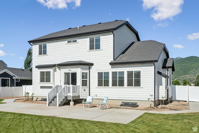 319 S 300 E, Midway, UT 84049 - rear view of property featuring a patio area, a mountain view, and a shingled roof