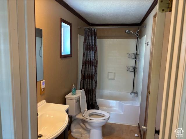 290 E 800 S, Roosevelt, UT 84066 - full bath with shower / bathtub combination with curtain, a textured ceiling, ornamental molding, and vanity