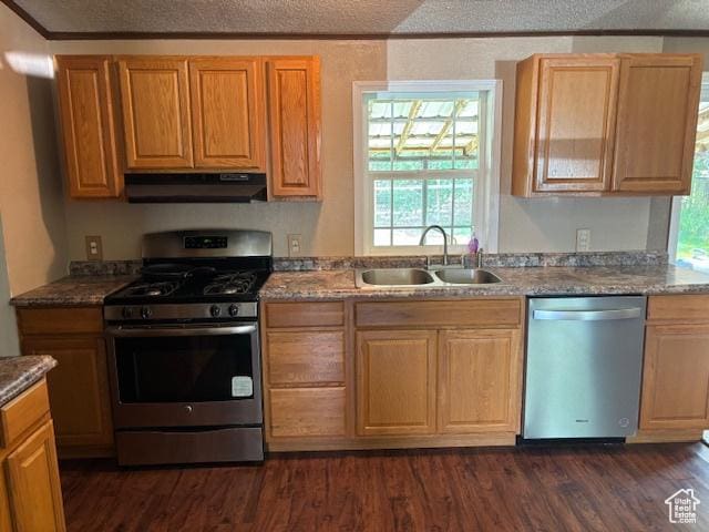 290 E 800 S, Roosevelt, UT 84066 - kitchen featuring appliances with stainless steel finishes, under cabinet range hood, dark wood-style flooring, and ornamental molding